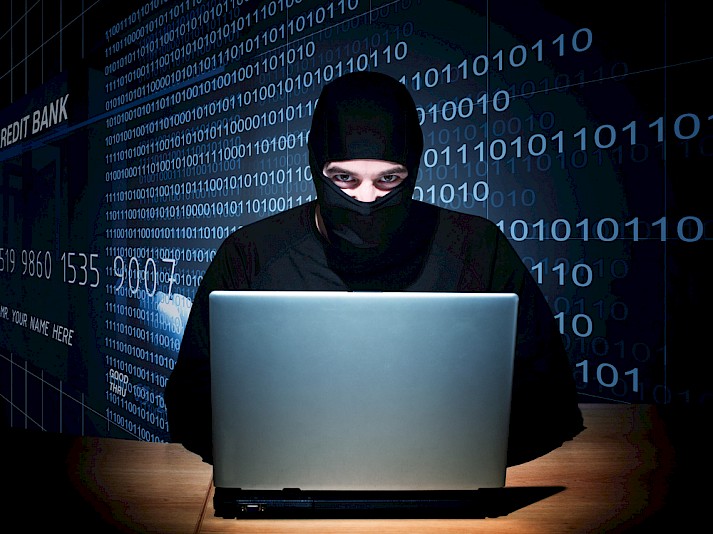 Hacker met zwarte bivak muts op